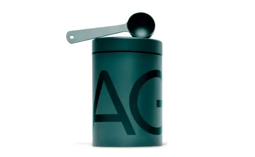 AG1 Athletic Greens Canister and Spoon